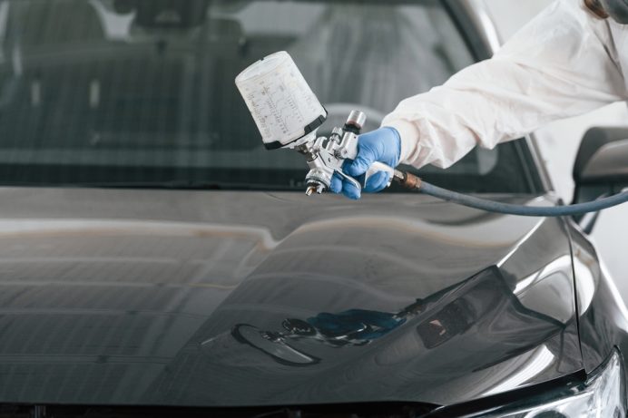 professional painting a car